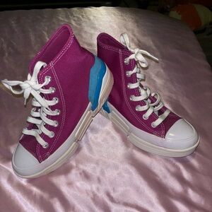 Purple and blue high top Converse
